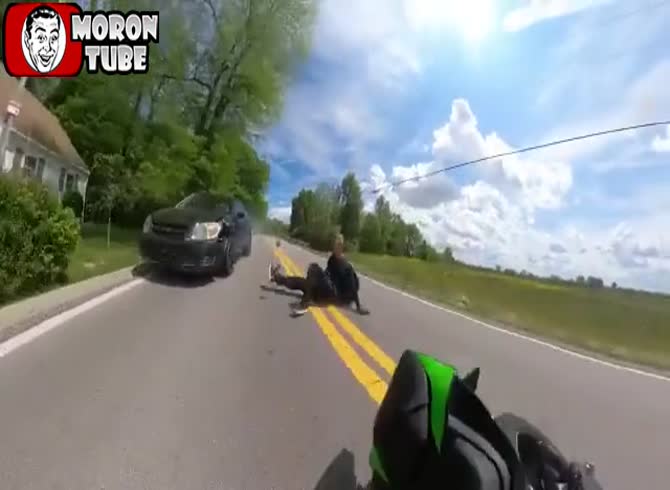 Video :When a biker slows down, a car strikes them